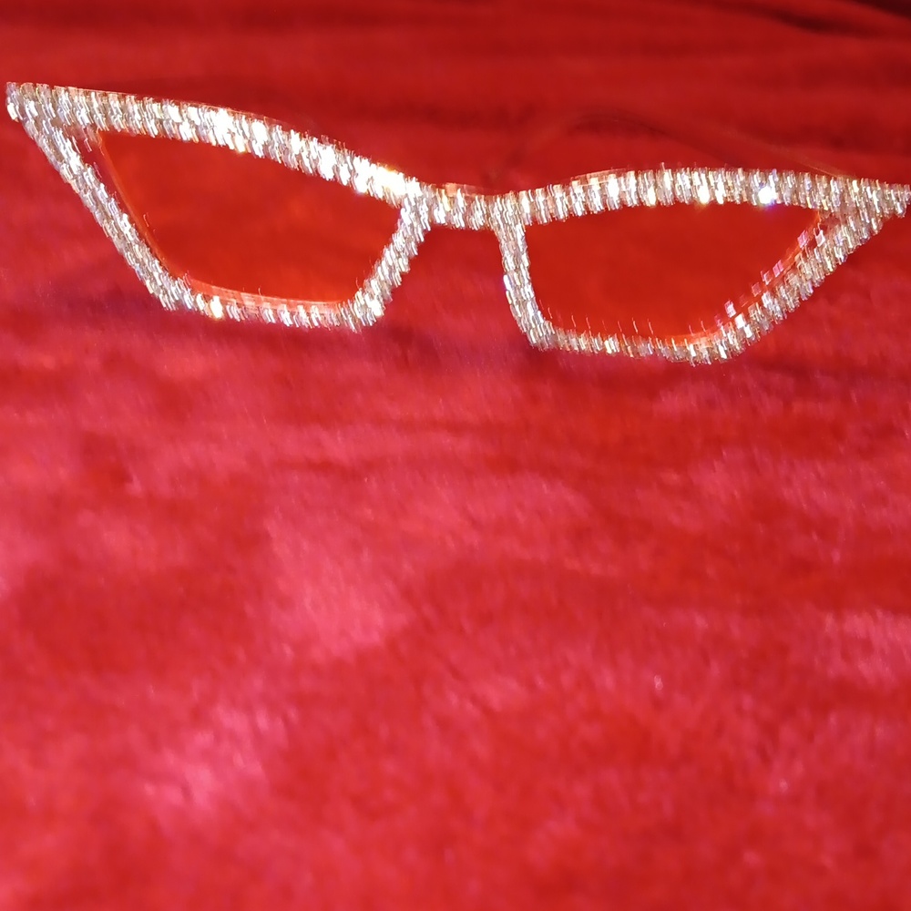 DIAMOND SUNGLASSES. Pink plastic frame sunglasses with bling.